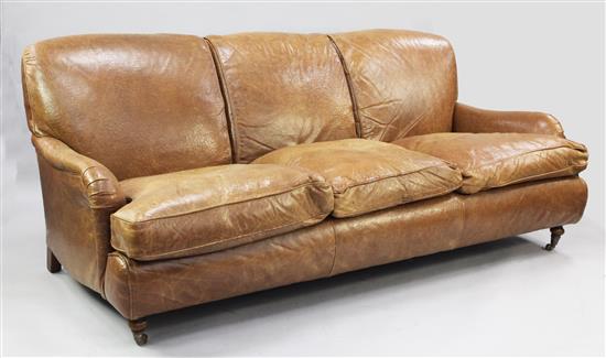 Brown leather three seater settee